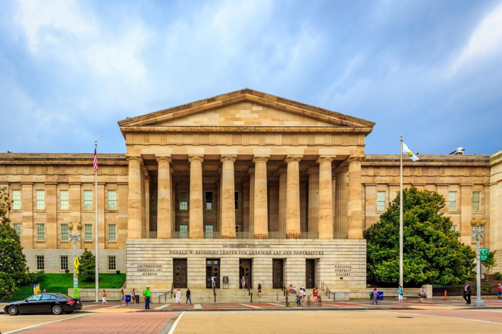 Smithsonian American Art Museum exterior with classical architecture, featuring large columns and visitors, emphasizing Dr. Glass and Doors' service area in the DMV.